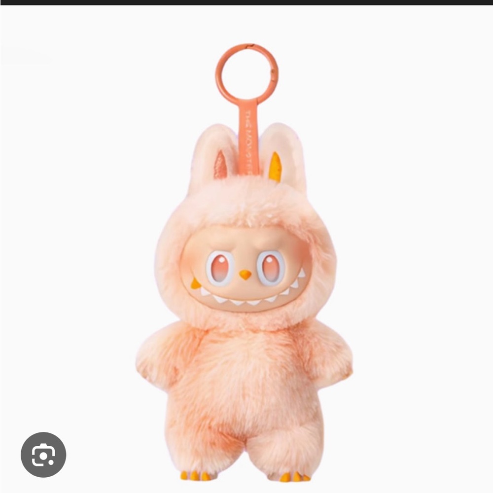 Cute Plush Keychain with Orange Accents